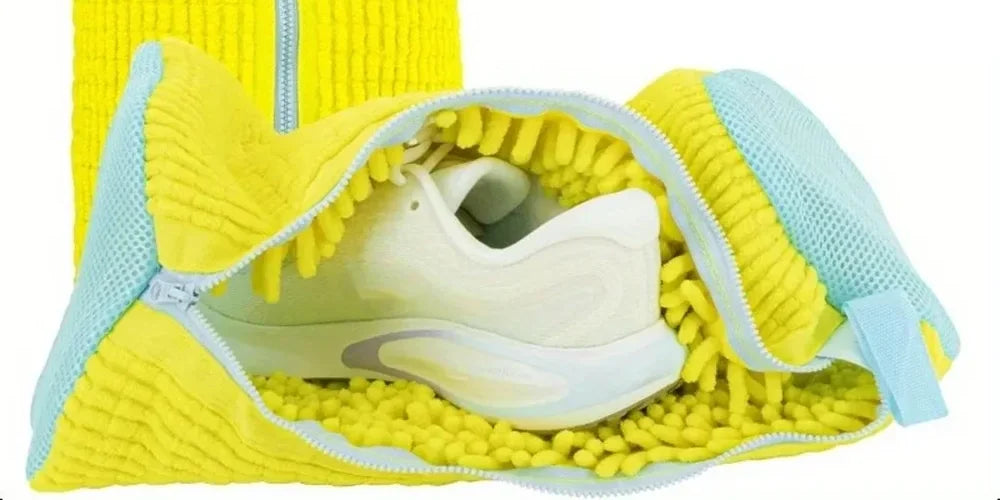 Open yellow chenille bag with a white sneaker inside, ready to zip